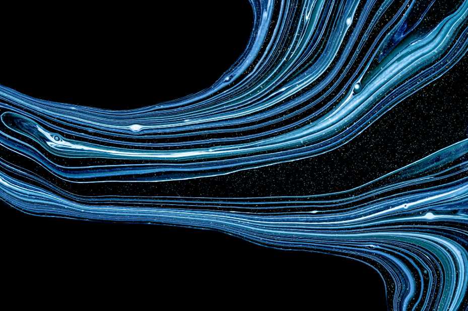 Long-exposure light streaks suggesting fast flow